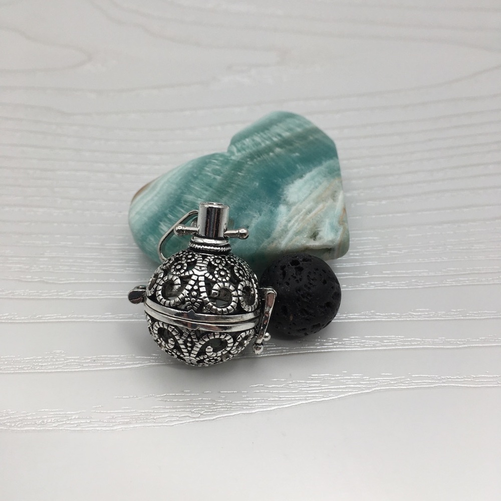 Pattern Aromatherapy Silver tone Locket.  Lava stone included.